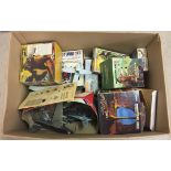 A box of made and part made plastic model kits to include Aurora Prehistoric scenes.
