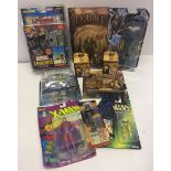 A box of action figure toys in original packaging to include The Hobbit, Marvel X-Men, Star Wars,