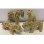 4 straw filled soft toy animals c1950s bought in Africa, comprising Tiger, Zebra, Leopard and Deer.