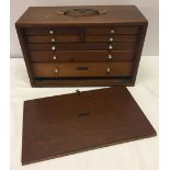 A portable collectors chest with lockable, removeable front. Approx 30 x 29cm.