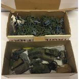 2 boxes of plastic toy soldiers and vehicles.