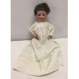 A vintage German Heubach Koppelsdorf doll 16 inches tall. Head #320.0.