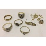 A bag of scrap 9ct gold jewellery weight approx 11g total. Includes 4 stone set ladies rings, 2 with