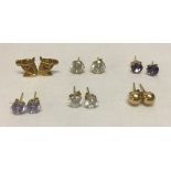 6 pairs of 9ct stud earrings - 4 pairs set with cubic zirconias, 1 pair have horses heads and the