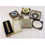 A small collection of compacts to include Strattons. Together with a 1970's Faberge "Tigress" dab