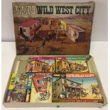 A Timpo Wild West City set comprising Marshal's Office, Stage Coach Station, Jail, Bank, Silver