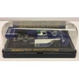 A boxed Scalextric C129 March Ford 240 6 wheeled Formula 1 car.