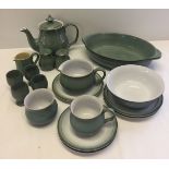 A quantity of green Denby tea/dinnerware comprising a teapot, sauce boat & saucer, sugar bowl,