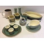 A box of assorted Denby, Holkham and Poole ceramics to include: egg cups and cruet.