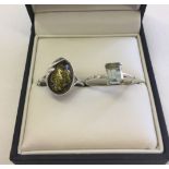 2 925 silver dress rings, One set with a pale blue stone size Q, the other set with amber size P.