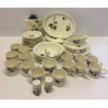 A Palissy tea set comprising 6 dinner plates, 7 salad plates, 5 side plates, oval serving plate, 2