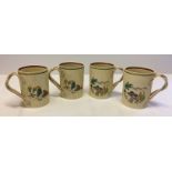 A set of 4 Adams Titian Ware tankards with plaited handles and Mexican themed decoration.