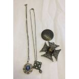 4 pieces of celtic style jewellery, 2 necklaces, 1 brooch and a large cross pendant.