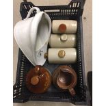 A crate of misc stoneware items comprising: 4 foot warmers, a large stoneware jug and a Fullers