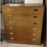 A light oak 6 drawer chest of drawers with flush brass handles. 88cm wide x 100.5cm tall.
