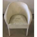 Lloyd Loom style tub chair with sprung & padded seat.