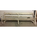 A large garden bench, approx 6 seater, 244cm long.