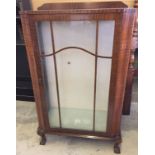 A mahogany 2 over 2 chest of drawers with decorative glass knobs. Measures approx 111cm wide and