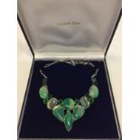 An ornate necklace set with large green agate stones & green glass stone in 925 silver mounts. Clasp