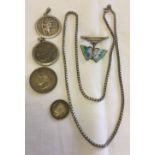 2 silver St. Christopher pendants together with a silver chain and silver and enamelled drop