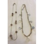 2 necklaces, one with brown quartz stones and the other with chalcedony stones. Clasps marked 925.