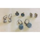 4 pairs of 925 silver earrings - 2 pairs of drop earrings and 2 pairs of studs.