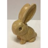 A Sylvac rabbit #990 in light brown 13cm tall (not impressed Sylvac).