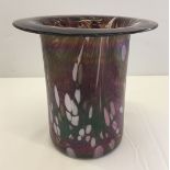 An iridescent top hat vase by Midsummer Glassmakers of Cambridge.