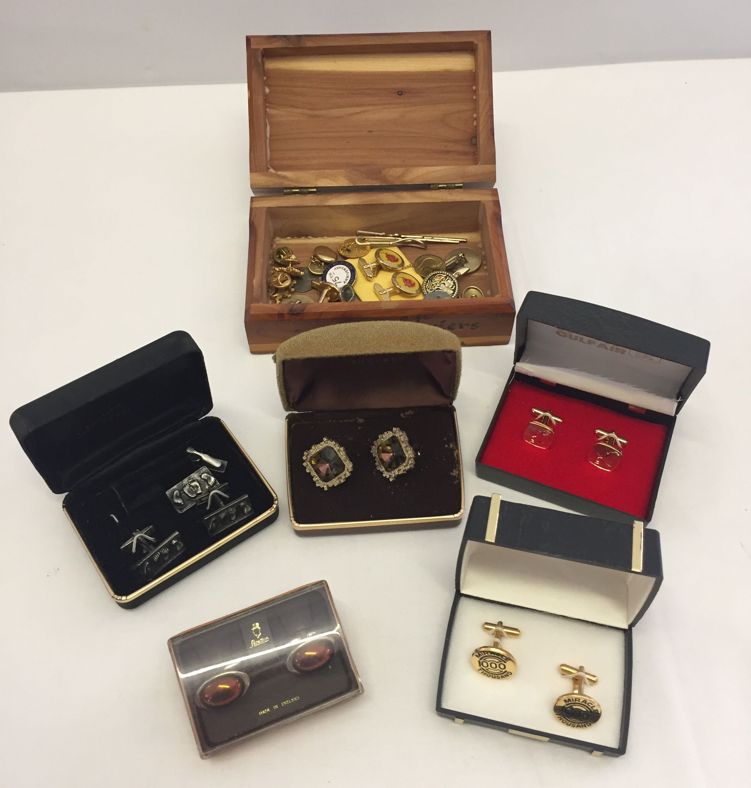 A box of mixed cufflinks to include Strattons.