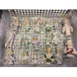 A collection of 18 ceramic half dolls to include 2 pairs of legs.