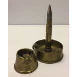 2 pieces of brass trenchart, a small ashtray and an ashtray with lighter, both embossed with Royal