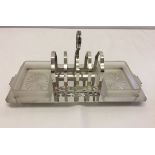 A silver plated toast rack with cut glass dishes for butter & conserves. EPNS AI plate.