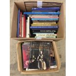 A large box of books about the Queen Mother together with a box of books relating to the Royal