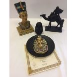 A collection of items relating to Ancient Egypt to include a resin bust of Nefertiti and a Bradex