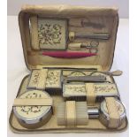 Vintage c.1950's ladies vanity case made by Two-Tix in luxan hide. Contains brushes, pots, mirror