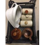 A crate of misc stoneware items comprising: 4 foot warmers, a large stoneware jug and a Fullers