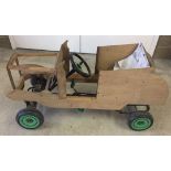 A part built childs pedal car with plans.