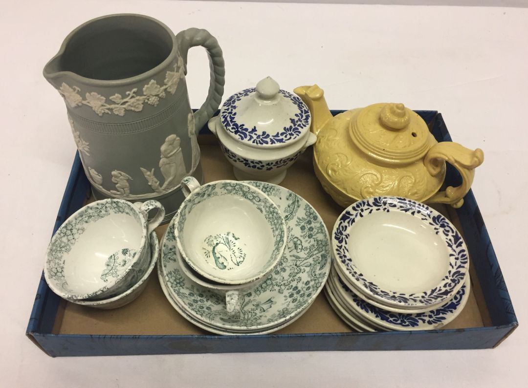 A small collection of ceramics to include Jasperware jug and childs part tea sets.