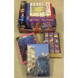 12 boxed jigsaws - vendor advises complete.