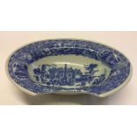 A blue & white ceramic Victoria Ware Ironstone shaving bowl. With shaped front.