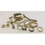 A bag of scrap/broken 9ct gold jewellery. Total weight approx 35.5g.