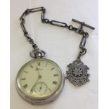 A silver Waltham pocket watch. Hallmarked Birmingham 1915 in working order on a HM silver albert