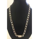 A heavy 925 Mexican silver 22inch curb link chain. Approx weight 102g.