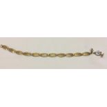 9ct gold panel bracelet with a globe charm. Total weight approx 3.7g