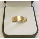 Hallmarked 18ct gold plain wedding band, size P. Weight approx 4g.