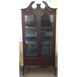 A Victorian mahogany display cabinet with blue velvet lined interior. Size approx 82cm x 188cm