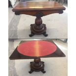 A mahogany Victorian games table with carved decorative base. Approx 92cm x 75cm high.