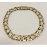 9ct gold engraved curb link bracelet, each link approx 1cm square. Length 23cm, weight approx 14.