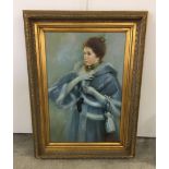A large portrait of a lady at a masked ball. Oil painting in ornate frame. Not signed.