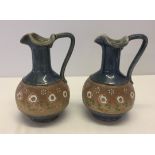 A pair of Royal Doulton jugs dated c.1920's with trefoil rims.